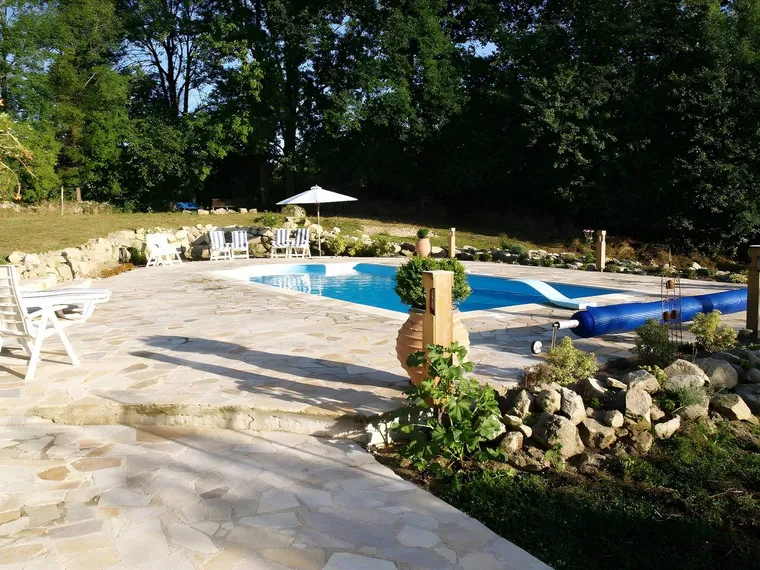 Buitenruimte en zwembad van Villa Felinas